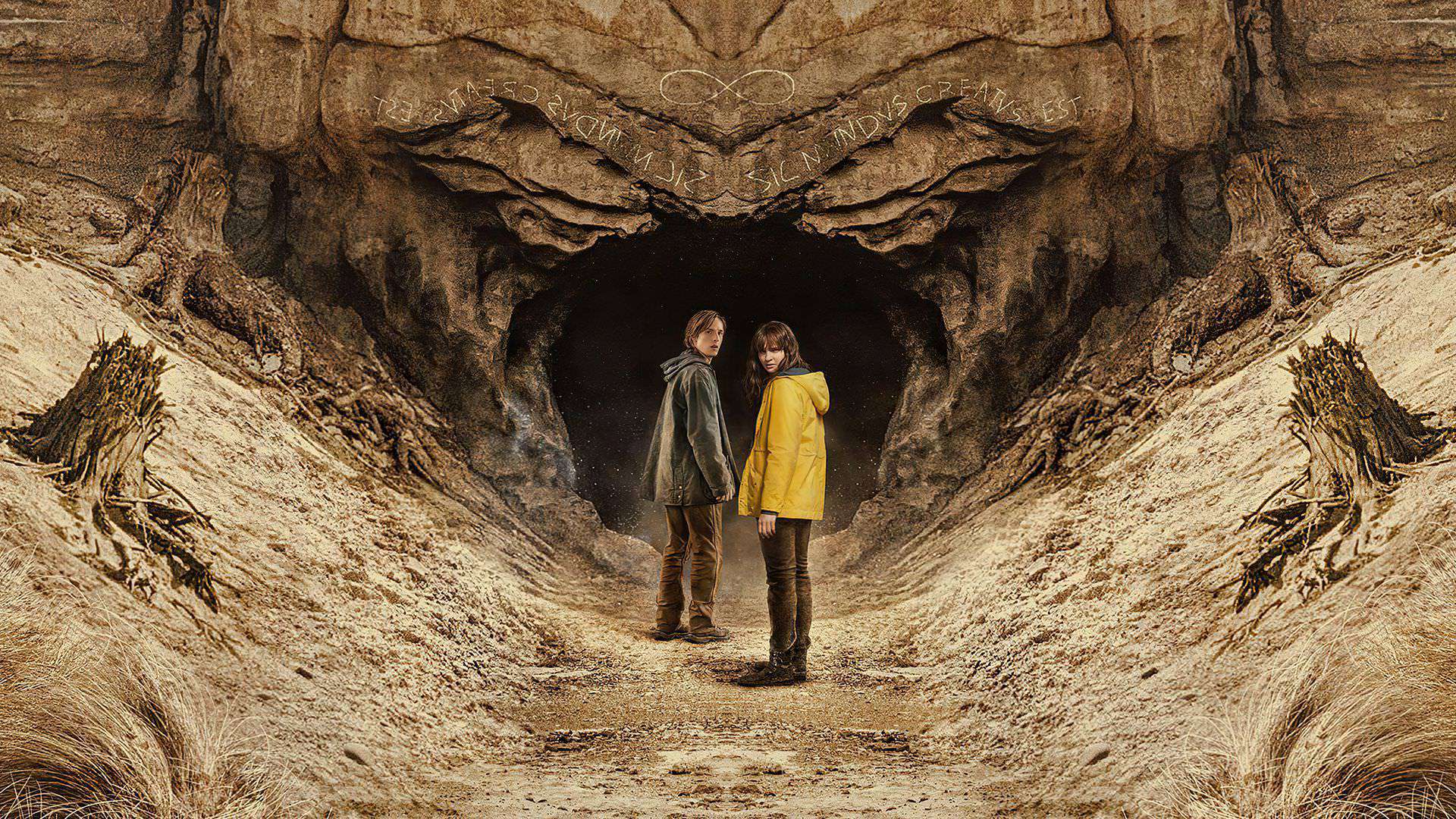 جوناس و مارتا در ورودی غار ویندن در پوستر فصل سوم سریال Dark